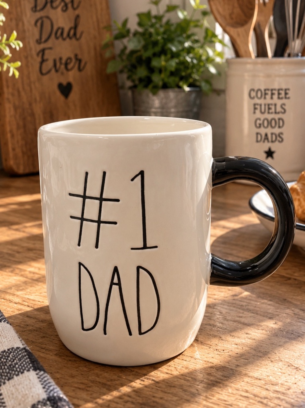 the Rae Dunn Artisan Collection featuring "#1 Dad" NWOT